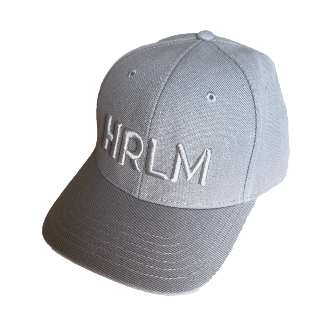 Gray cap with 'HRLM' embroidery on a gray background