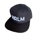Black cap with 'HRLM' text on a white background