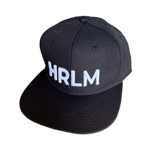 Black cap with 'HRLM' text on a white background